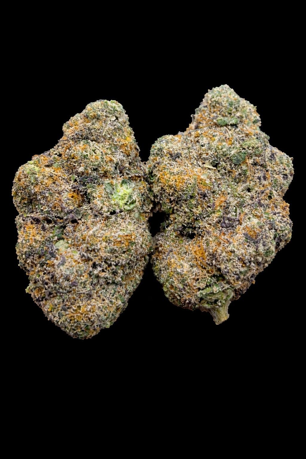 High-quality cannabis buds covered in trichomes, vibrant purple and green tones for medical use.